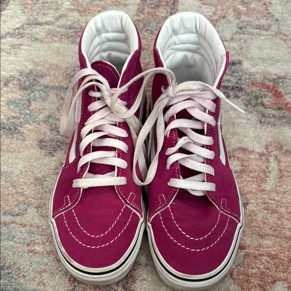Vans Fuchsia High-Top Sneakers
Shows signs of wear, overall in good condition.